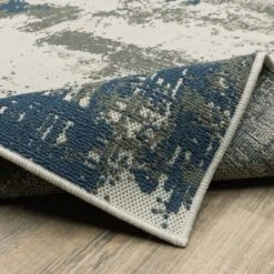 Trinity Modern Distressed Abstract Patio Area Rug Beige/Blue - Captiv8e Designs 21 Trinity Modern Distressed Abstract Patio Area Rug Beige/Blue - Captiv8e Designs -Home Improvement Store GUEST 69bea875 354f 4e79 a476 91f7657dc401