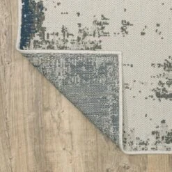 Trinity Modern Distressed Abstract Patio Area Rug Beige/Blue - Captiv8e Designs 18 Trinity Modern Distressed Abstract Patio Area Rug Beige/Blue - Captiv8e Designs -Home Improvement Store GUEST 78025ae6 ad6d 4e3a a5d2 2007b50eb263