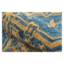 Cosette Samanna Geometric Tufted Accent Rug - Momeni