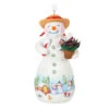 Hallmark Snowtop Lodge Terran S. Gardner Porcelain Ornament -Home Improvement Store Snowman with Flower Pot Keepsake Ornament 2299QXR8119 01
