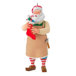 Hallmark Toymaker Santa Surprise Mystery Ornament 12 Hallmark Toymaker Santa Surprise Mystery Ornament -Home Improvement Store Toymaker Santa Holding Stocking Keepsake Ornament 1999QGO2967 02
